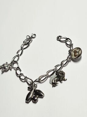 Charm Bracelet With 2 Sterling Silver Charms Poodle, Lion, Bowling Pins, Aries